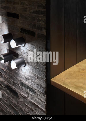 Wall lamp and desk. 55 Victoria Street, London, United Kingdom. Architect: Stiff + Trevillion Architects, 2016. Stock Photo
