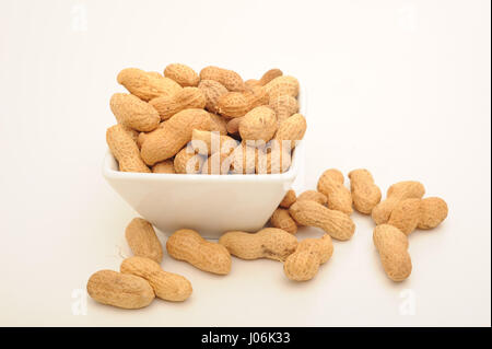 peanuts in a bowl isolated on white Stock Photo