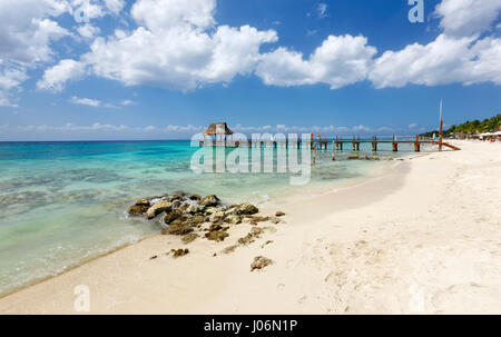 Wooden pier on the sand beach Stock Photo