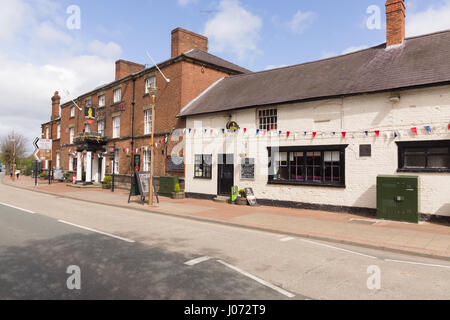 The Welsh town of Chirk or Y Waun (in Welsh) on the border of Wales and England with it's old 16th century coaching inn Stock Photo