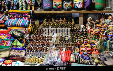 At the markets in Aguas Calientes, colourful souvenirs and interesting chess pieces on display to take home after visiting Machu Picchu in Peru. Stock Photo