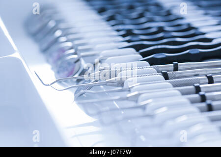 Exploratory dental tools - dental explorer, periodontal probe, dental mirror Stock Photo