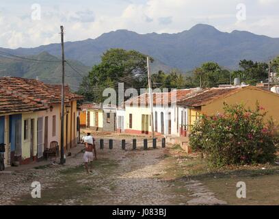 A back street lined with colourful painted houses in the colonial town of Trinidad in Cuba Stock Photo