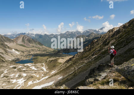 France, Pyrenees, Neouvielle Natural Reserve, landscape with hiker Stock Photo