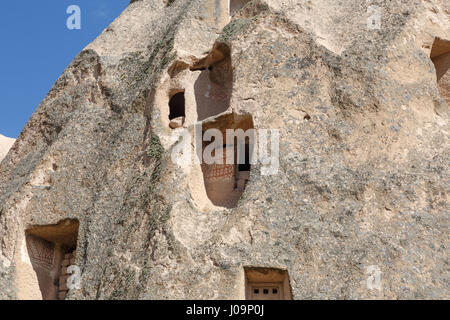Close up detailed view of small sandstone tufa caves. Stock Photo