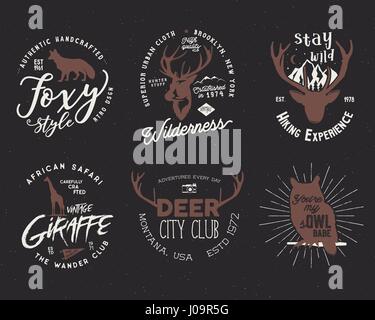 Wild animal badges set. Included giraffe, owl, fox and deer shapes. Stock vector isolated on dark background. Good for tee designs Stock Vector