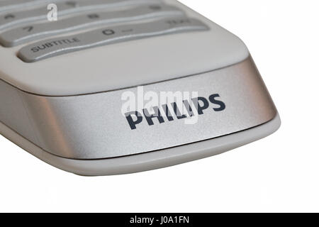 KIEV, UKRAINE - APRIL 17, 2016: Logo Philips on modern smart TV remote control closeup isolated on white. Philips is a Dutch technology company focuse Stock Photo