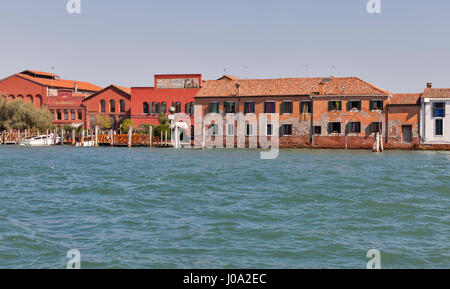 MURANO, ITALY - SEPTEMBER 22, 2016: Famous Ducale glass making factory facade on the shore of S. Giovanni canal. Murano is a series of islands linked  Stock Photo