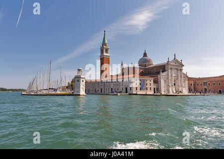 VENICE, ITALY - SEPTEMBER 23, 2016: Unrecognized people visit church of San Giorgio Maggiore. Venice is situated across a group of 117 islands that ar Stock Photo