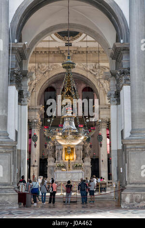 VENICE, ITALY - SEPTEMBER 23, 2016: Unrecognized people visit Basilica di Santa Maria della Salute inside. Venice is situated across 117 small islands Stock Photo