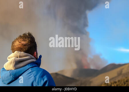 EXPLOSIVE pictures of Mount Etna have been captured by an awe-struck local man. The sheer power of the eruption can be clearly seen by the surge of lava and ash – as well as the streaks of lighting caused by the intense static electricity the mighty volcano caused. Other pictures show curious onlookers hiking TOWARDS the eruption in an attempt to capture photographs the mighty Sicilian giant. Photographer Marco Restivo (29) was among them. Stock Photo