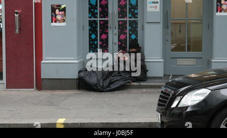 various people begging or sleeping rough on London streets Stock Photo