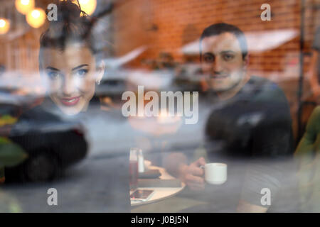 young couple meets in a cafe on a date Stock Photo