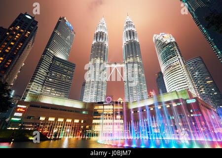 Kuala Lumpur, Malaysia - March 10, 2017: Petronas Twin Towers at night on March 10, 2017 in Kuala Lumpur, Malaysia. The skyscrapers height are 451.9m  Stock Photo
