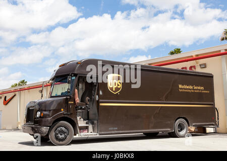 Homestead, Fl, USA - March 17, 2016: United Parcel Service delivery truck delivering packages to the stores in a mall. Florida, United States Stock Photo