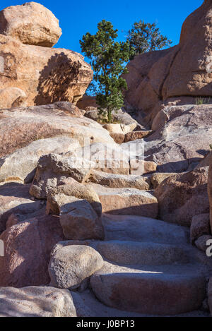 Stones steps on the trail through Hidden Valley. Joshua Tree National Park, California, USA. Stock Photo
