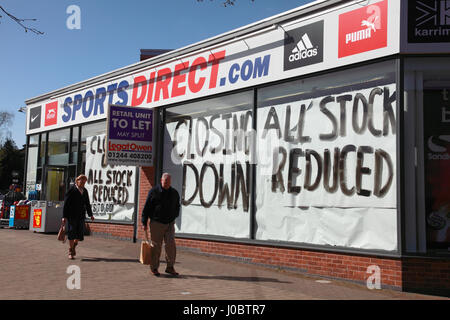 The branch of Sports Direct in the market town of Market Drayton, Shropshire, with signs showing it is about to close. Stock Photo