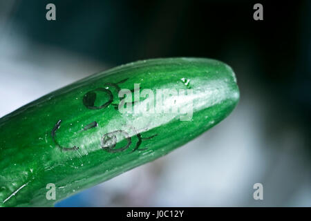 A calm cucumber smiling against the camera. Stock Photo