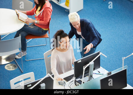 University students working in library Stock Photo
