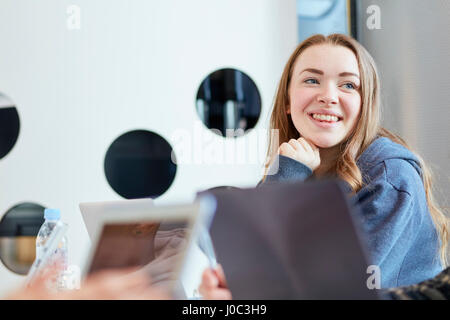 University students using laptops and digital tablet, working together Stock Photo