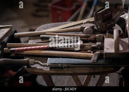 Farriers tools in workshop Stock Photo