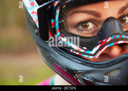 Close up portrait of female BMX rider in crash helmet Stock Photo