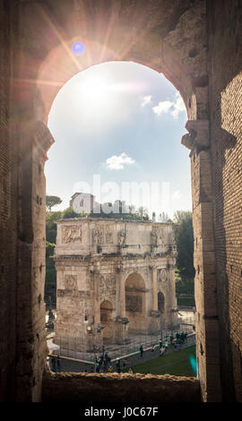 Sunlit view from Colosseum of the Arch of Constantine, Rome, Italy Stock Photo