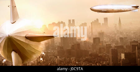 Old airships over the city Stock Photo