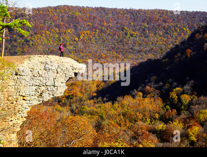 Hiker on Hawksbill Crag at Whittaker Point in the Upper Buffalo Wilderness Area of the Ozark Mountains. Stock Photo