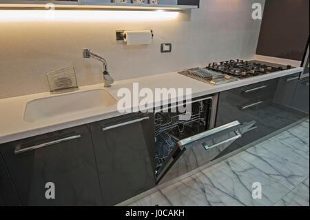 Interior design decor showing modern kitchen and appliances in luxury apartment showroom Stock Photo