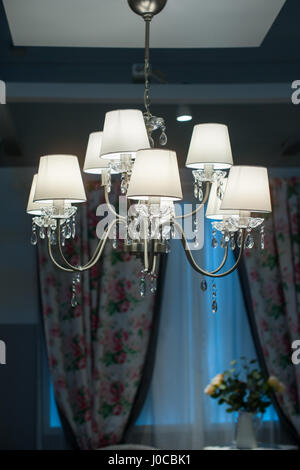 decorative designer chandelier on a dark background Stock Photo