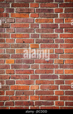 Picture of an old weathered clinker brick wall, background or texture. Stock Photo