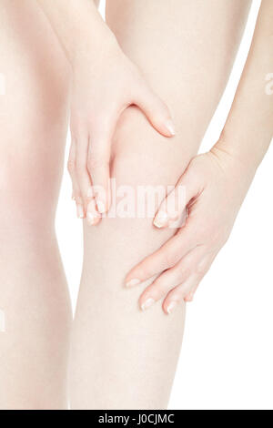 Woman fatigued leg with knee pain isolated on white, clipping path Stock Photo