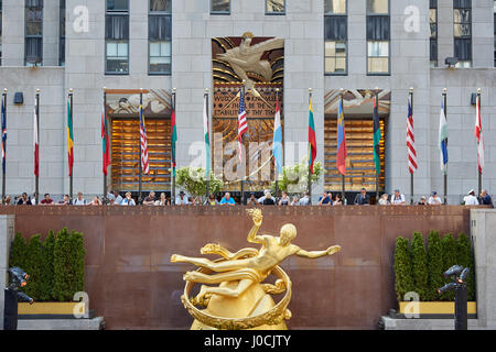 NEW YORK - SEPTEMBER 12: Rockefeller Center with golden Prometheus statue and people on September 12th, 2017 in New York Stock Photo