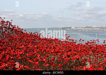 'Poppies: Wave' is one of two sections of the 'Blood Swept Lands and Seas of Red' art installation. The artist of the work - Paul Cummins - opened the Wave section today on Barge Pier in Shoeburyness, Essex, UK Stock Photo