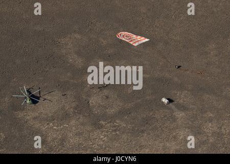 Zhezkazgan, Kazakhstan. 10th Apr, 2017. The Russian Soyuz MS-02 spacecraft lands in a remote area April 10, 2017 near Zhezkazgan, Kazakhstan. The rocket is carrying the International Space Station Expedition 50 mission crew astronaut Shane Kimbrough of NASA and cosmonauts Sergey Ryzhikov and Andrey Borisenko of Roscosmos after 173 days in space. Credit: Planetpix/Alamy Live News Stock Photo