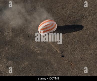 Zhezkazgan, Kazakhstan. 10th Apr, 2017. The Russian Soyuz MS-02 spacecraft lands in a remote area April 10, 2017 near Zhezkazgan, Kazakhstan. The rocket is carrying the International Space Station Expedition 50 mission crew astronaut Shane Kimbrough of NASA and cosmonauts Sergey Ryzhikov and Andrey Borisenko of Roscosmos after 173 days in space. Credit: Planetpix/Alamy Live News Stock Photo