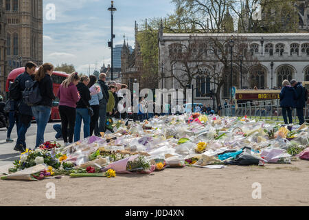 London, UK - April 11th, 2017: Memorial in front of the Houses of Parliament, to the 6 dead and 49 injured from the terrorist attack in Westminster, London which occured on March 22nd, 2017 Credit: Alexandre Rotenberg/Alamy Live News Stock Photo
