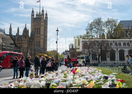 London, UK - April 11th, 2017: Memorial in front of the Houses of Parliament, to the 6 dead and 49 injured from the terrorist attack in Westminster, London which occured on March 22nd, 2017 Credit: Alexandre Rotenberg/Alamy Live News Stock Photo