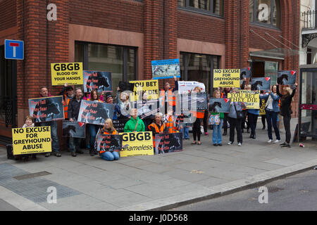 London, UK. 12th Apr, 2017. Greyhound protection campaigners stage a protest outside the Greyhound Board of Great Britain (GBGB), who are accused of a lack of care towards the welfare of the greyhounds and are currently being investigated over allegations of fraud and bribery, as thousands are needlessly destroyed every year. Credit: Steve Parkins/Alamy Live News Stock Photo