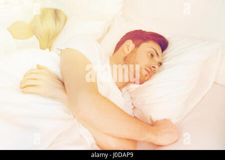 young man suffering from insomnia Stock Photo