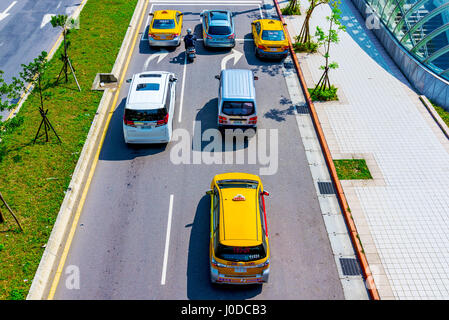 TAIPEI, TAIWAN - MARCH 28: This is an aerial view of road with taxis waiting at traffic lights in Xinyi financial district on March 28, 2017 in Taipei Stock Photo