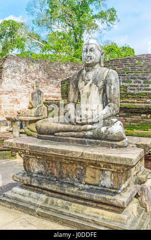 The statue of Meditating Lord Buddha in Stupa House (Vatadage) at Dalada Maluwa, Polonnaruwa, Sri Lanka. Stock Photo