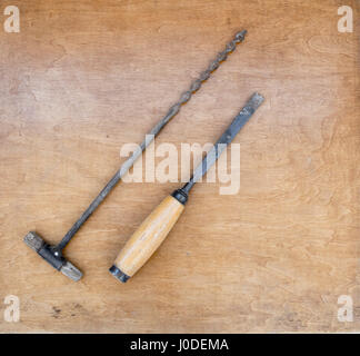 old vintage hand tools on wooden background Stock Photo