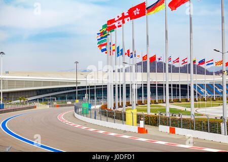 Motor racing track. Turning asphalt road with marking lines Stock Photo