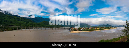 Horizontal panoramic view of the Hai Van pass and tunnel entrance at Lang Co, Vietnam Stock Photo