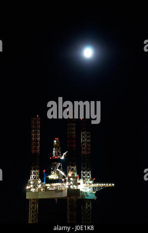 Oil Rig Platform at Night Stock Photo
