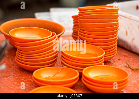 Orange bowls on the street market, Beijing, China Stock Photo