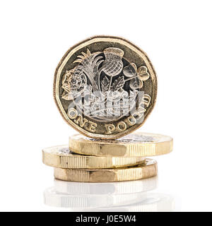 SWINDON, UK - APRIL 06, 2017: 4 New One Pound coins on a white background Stock Photo