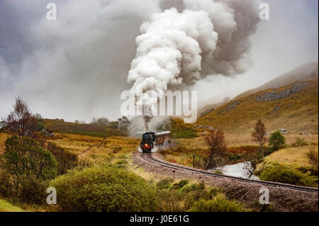 THe Lancashire Fusilier Black Five steam locomotive hauling the Jacobite train on the West Highland Railway from Fort William to Mallaig. Stock Photo